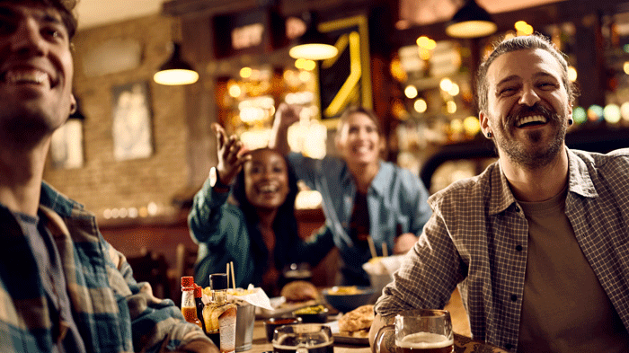 This is an image of people drinking in a pub